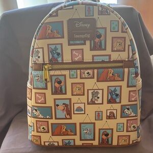 (SOLD). Loungefly Brown and Cream Character Backpack